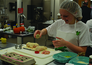 A 4-H student doing a cooking class